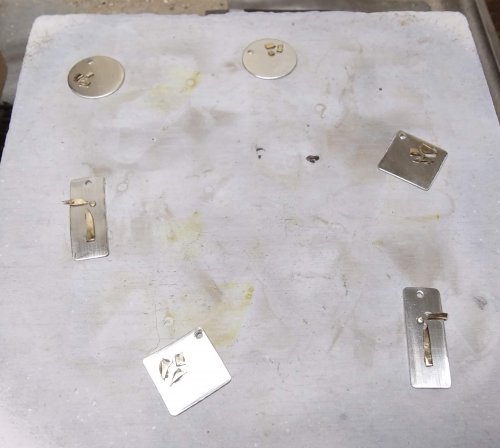 Judy Larson's Silver and Gold Earrings - , Contemporary Wire Jewelry, Butane Torch, Soldering, Solder, Space the pieces out on a Solderite board.